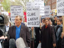May Day 2006 – locked-out Gate Gourmet workers with a message for TGWU leader TONY WOODLEY