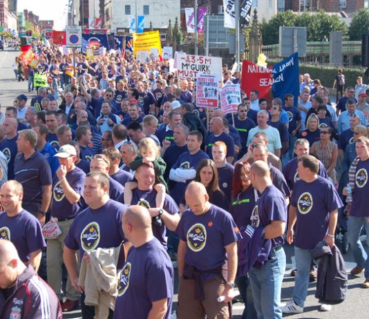 Firefighters marching on Friday through Liverpool on a national demonstration to support Merseyside firefighters defending the service