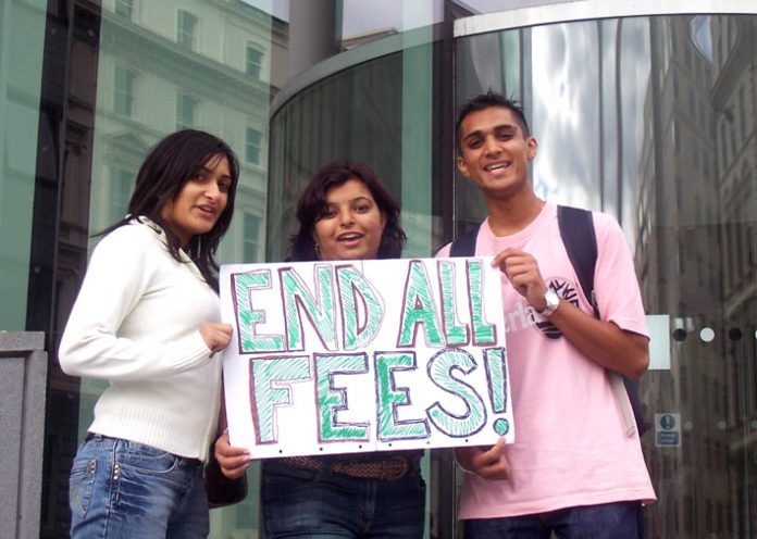 Students, who are part of the first year to pay £3,000 fees, showing their opposition to all fees