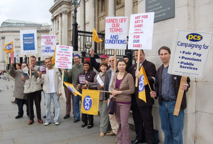 PCS members on the picket line outside the National Gallery yesterday, determined to defend their pay and conditions