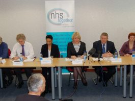 The  platform at the ‘NHS Together’ press conference on Tuesday