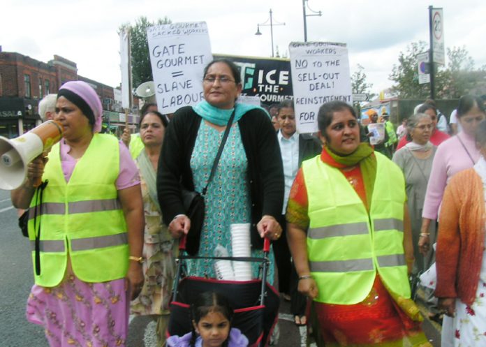 Gate Gourmet sacked workers marching through Southall on August 20 this year to mark the first yearof their struggle. Now they are campaigning for a successful rally this Sunday on the eve of their employment tribunal