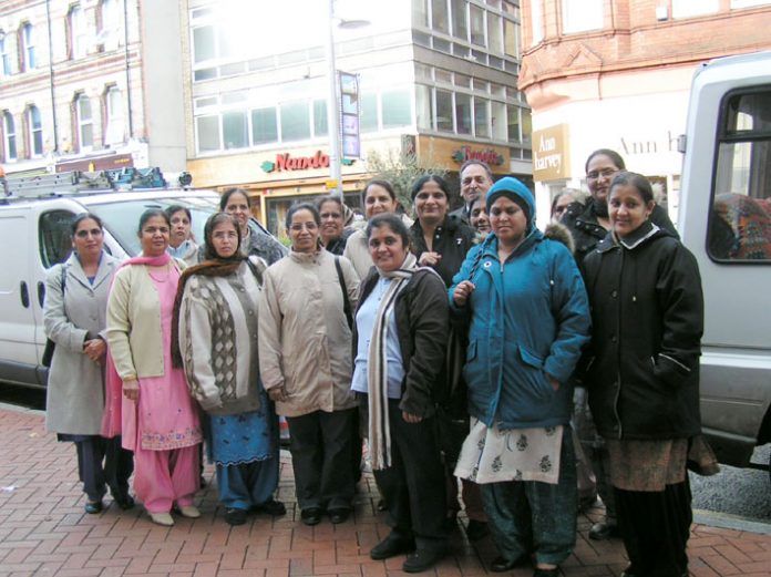 A number of the sacked Gate Gourmet workers outside their Employment Tribunal in Reading yesterday morning