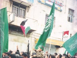 Hamas And Fatah Leaders Call For National Unity Palestinian and Hamas flags on a demonstration in Ramallah against the Israeli occupation