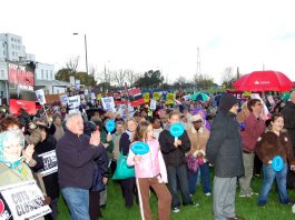 A secion of last Saturday’s 1,500-strong rally with St Helier Hospital in the background