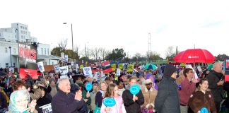 A secion of last Saturday’s 1,500-strong rally with St Helier Hospital in the background