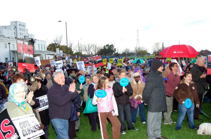 A secion of last Saturday’s 1,500-strong rally with St Helier Hospital in the background