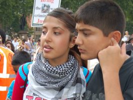 Young girl on a demonstration in London against the Israeli war on the Lebanon with a clear message