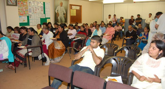 Katsouris Fresh Foods workers at a GMB meeting in Alperton on health & safety following a number of workplace injuries