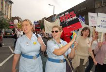 Nurses marching against NHS cuts in Nottingham on September 23
