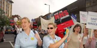 Nurses marching against NHS cuts in Nottingham on September 23