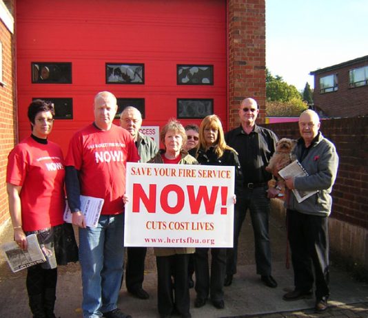 Campaigners fighting against cuts to the Herts fire service outside Radlett fire station in Ocober