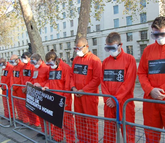 Amnesty protesters as ‘Guantanamo prisoners’ opposite Downing Street