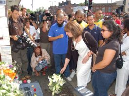 Vigil outside Stockwell Tube station on July 22nd, a year after Jean Charles de Menezes was shot dead by police as he boarded a tube train