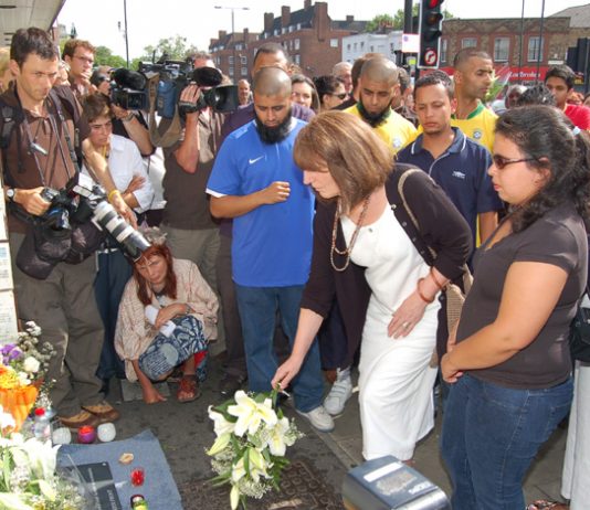 Vigil outside Stockwell Tube station on July 22nd, a year after Jean Charles de Menezes was shot dead by police as he boarded a tube train