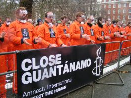 ‘GUANTANAMO IS A GULAG!’ – says Moazzam Begg More than 500 demonstrators dressed in boiler suits to symbolise the hundreds of people still held in Guantanamo Bay. Part of a worldwide demonstration taking place five years after the camp was opened