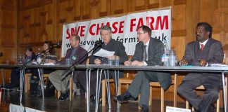 Platform of Saturday’s packed ‘Save Chase Farm’ meeting, (L-R) consultant ANNA ATHOW, Maternity Liaison Committee member Gail McCONNELL, Ambulanceman Jonathan FOX, chair STEPHEN ARMSTRONG, Save Chase Farm councillor KIERAN McGREGOR, local GP Dr NICHOLAS P