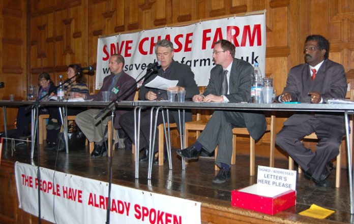 Platform of Saturday’s packed ‘Save Chase Farm’ meeting, (L-R) consultant ANNA ATHOW, Maternity Liaison Committee member Gail McCONNELL, Ambulanceman Jonathan FOX, chair STEPHEN ARMSTRONG, Save Chase Farm councillor KIERAN McGREGOR, local GP Dr NICHOLAS P