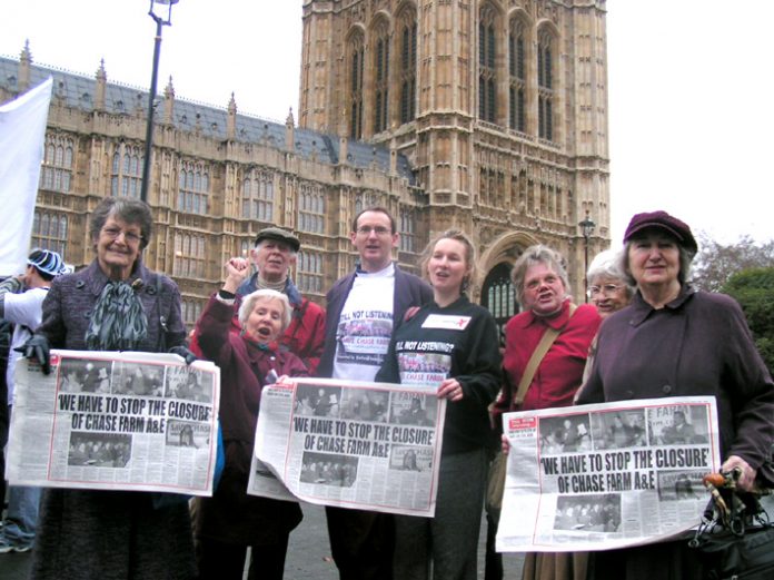 ‘Save Chase Farm’ councillors KEIRAN McGREGOR and KATE WILKINSON (wearing T-shirts) with fellow campaigners lobbying Parliament yesterday