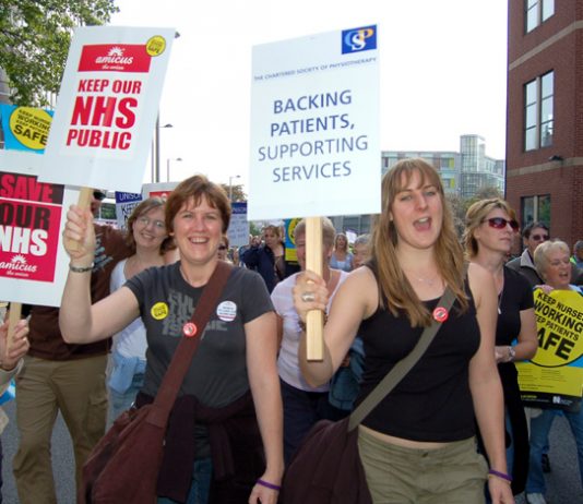 Demonstrating health workers opposing the government’s privatisation of the NHS marching through Nottingham last September