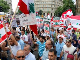 ‘OLMERT WILL EITHER RESIGN OR BE TOPPLED’ says Hezbollah leader Nasrallah Demonstrators in London on July 27 last year condemn Olmert and Bush for their crimes in Lebanon