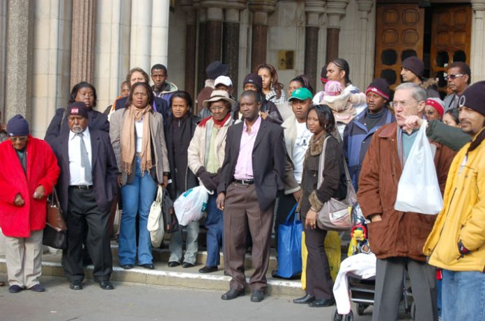 The Chagos Islanders outside court in The Strand yesterday after the British government began its appeal against their right to return home.