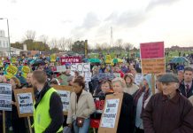 Rally to defend St Helier and Epsom hospitals last November when there were protests about patients being served cold meals  – now St Helier Trust  is removing light bulbs to cut bills