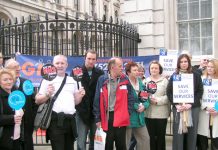 Trade unionists and local campaigners fighting the massive cuts at Derriford Hospital in Plymouth outside Downing Street yesterday, where they handed in a 12,000-strong petition against 60 more bed closures in a £25m cuts package