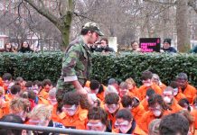 Guantanamo ‘guard’ menacing Amnesty ‘Guantanamo prisoners’ in a demonstration outside the US embassy in London to mark the fifth anniversary  of the first prisoners to be detained there