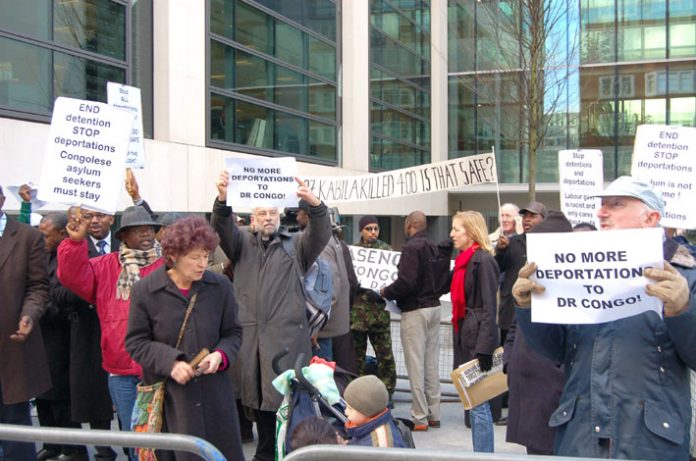 Demonstrators outside the Home Office yesterday demanding the government halts a charter flight that was due to take off to Democratic Republic of the Congo (DRC) last night, with worries that those being dispatched to the DRC would be in grave danger and