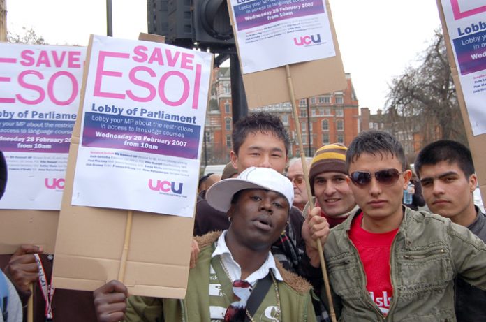 Young English language students with ‘Save Esol’ placards said they would be forced off courses if charges are imposed this autumn