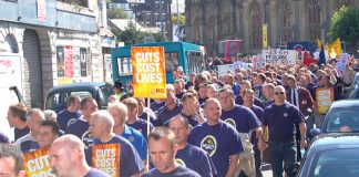 Thousands of firefighters marched in Liverpool last September in support of the Merseyside FBU strike against cuts