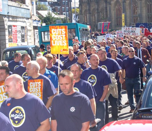 Thousands of firefighters marched in Liverpool last September in support of the Merseyside FBU strike against cuts