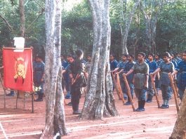 Female Tamil Tigers drill in the jungle