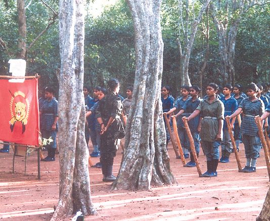 Female Tamil Tigers drill in the jungle