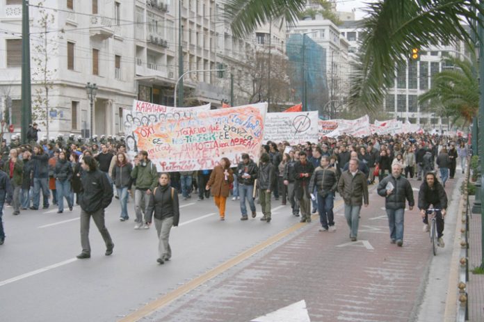 Students with their banners marching in Athens
