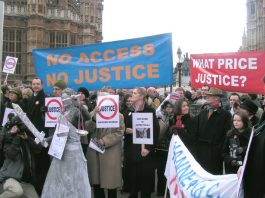 LEGAL AID BEING DESTROYED – Lawyers rally to defend ‘vital pillar of the Welfare state’ ‘Justice with her sword’ stands blindfolded among a crowd of hundreds of legal aid lawyers outside parliament on Monday