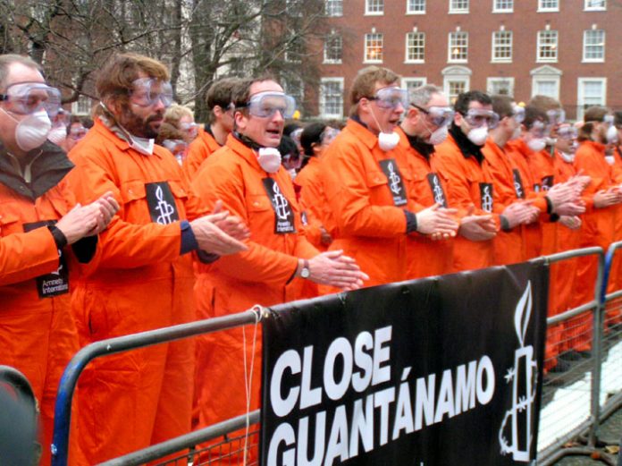 Protest outside the US embassy in London on January 11 – five years since the first prisoners were inarcerated at Guantanamo Bay