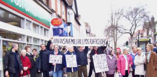 Postal workers and local residents protest against the closure of Mill Hill Post Office in north London