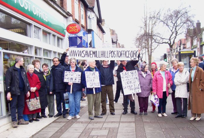 Postal workers and local residents protest against the closure of Mill Hill Post Office in north London