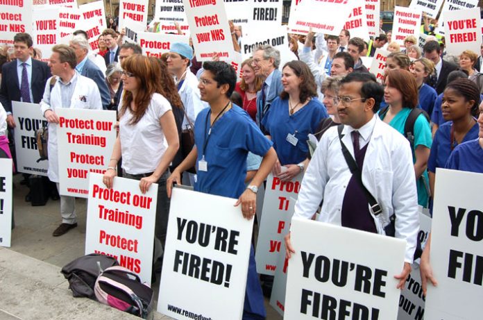 Hundreds of angry doctors at yesterday’s rally outside parliament against the government’s assault on their jobs and training