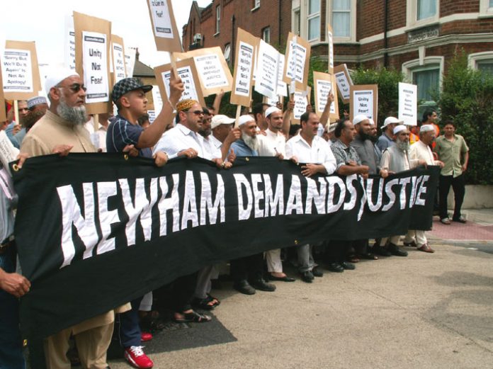 Newham residents demonstrate in the borough after a young postal worker was shot by police