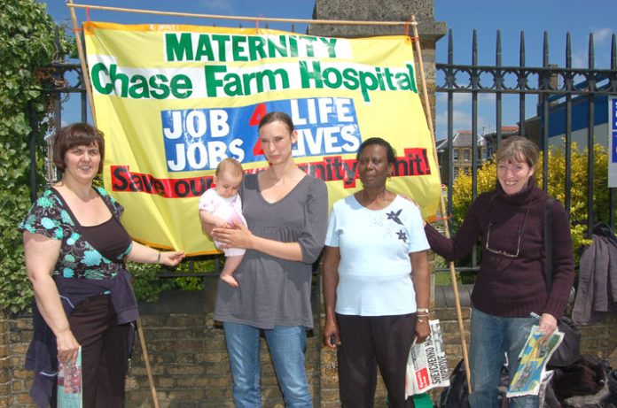 From the left: Midwifery assistant MARIA SUAREZ, a young mother, and North East London Council of Action members ROSETTA REEVES  and ANNA ATHOW on yesterday’s picket of Chase Farm Hospital