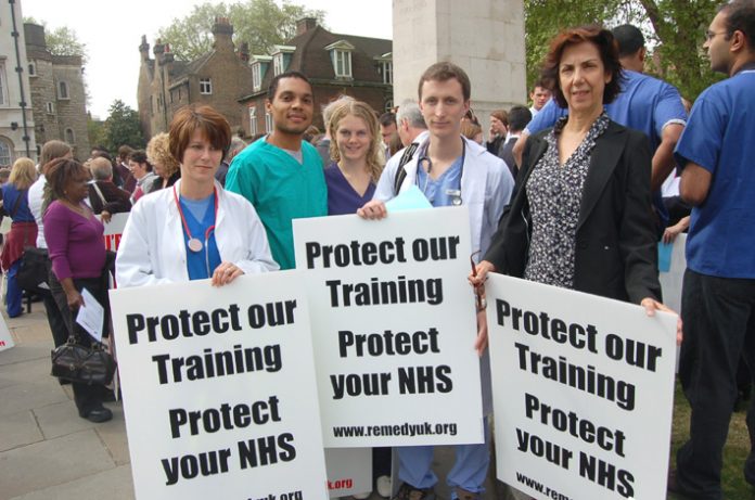 Junior doctors demanding training posts and calling for the defence of the NHS; many are very angry at the BMA for not defending them