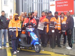 Confident pickets at Finsbury Park office in Green Lanes yesterday morning