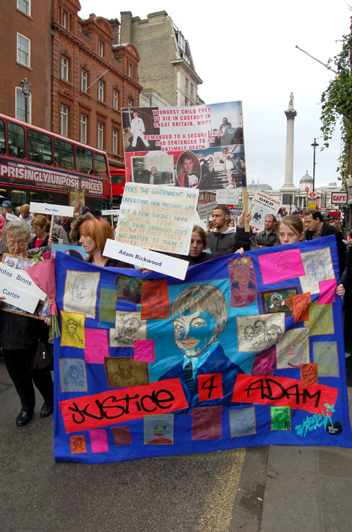 United Families and Friends demonstration to Downing Street last October showing the banner of Adam Rickwood, a 14-year-old who died whilst being ‘restrained’ at a Secure Training Centre within 3 months of Gareth Myatt’s death