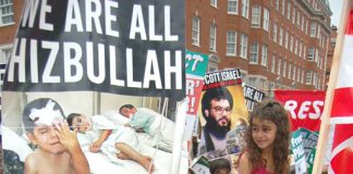 Marchers in London on July 24 last year show their support for Hezbollah