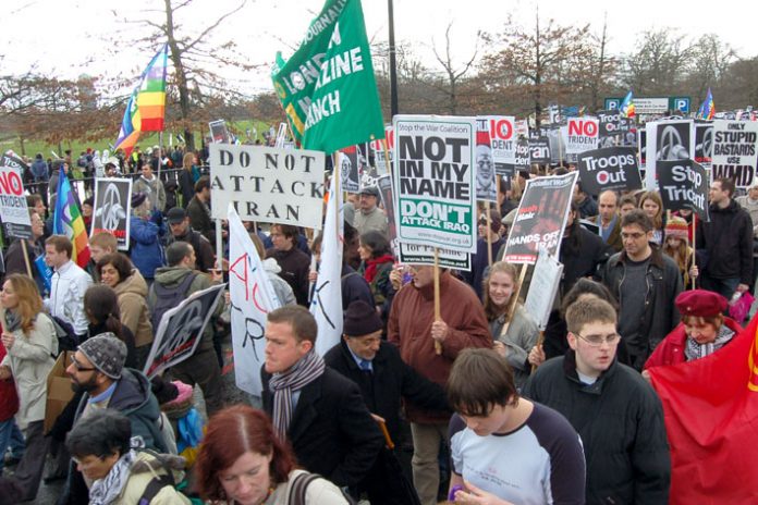 Marchers on February 24 against the war on Iraq demanding no attack on Iran