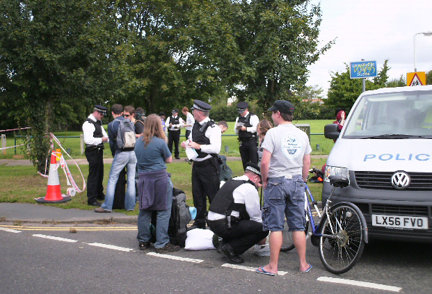 Police stop and search young people near to the Climate Change camp at Heathrow Airport