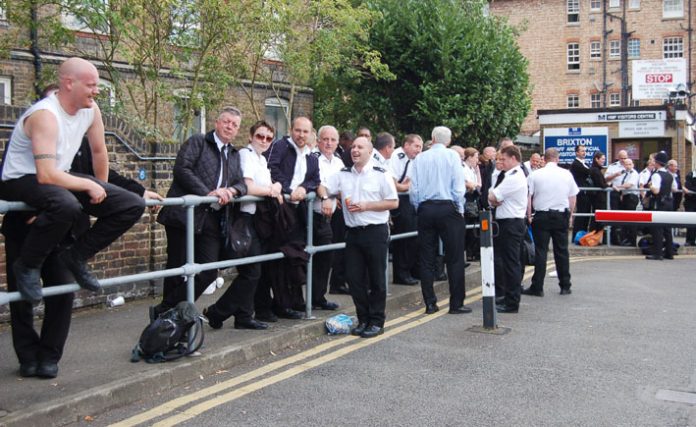 Striking prison officers outside Brixton prison yesterday